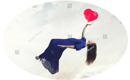Levitating lady touching a red heart 